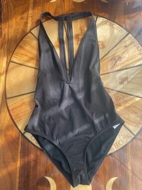 Plunging neckline black one piece swimsuit